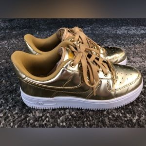 Nike Womens gold Air Force 1s size 7